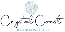 green seashell above the words 'crystal coast oceanfront hotel '