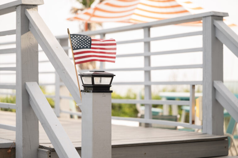 American flag at the beach entrance at Crystal Coast Oceanfront Hotel